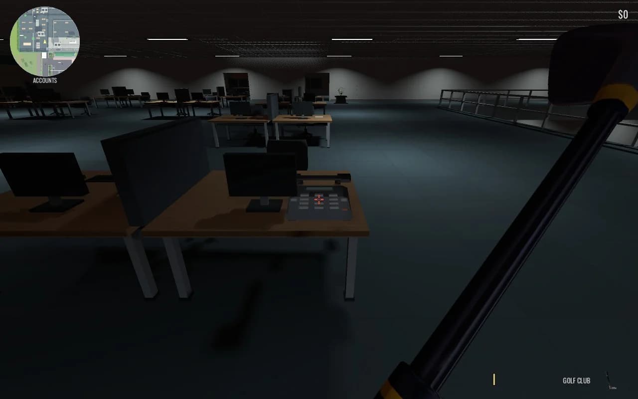 The Accounts office desk with a dark telephone in the foreground, monitor bank and dimly lit upstairs office beyond.